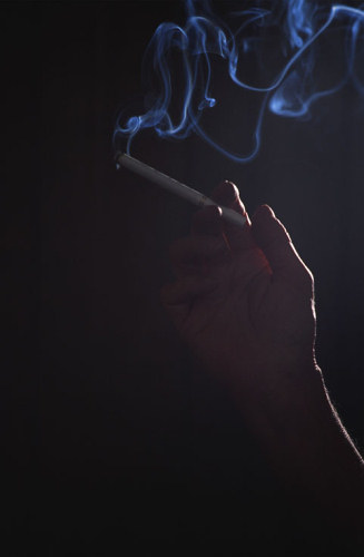 hand and smoke, getty images SO000349 (RF)